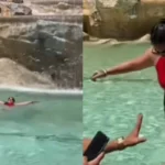 Una turista se lanza a la Fontana di Trevi en Roma para refrescarse por la ola de calor