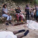 El jefe de una banda criminal de Haití amenaza con matar a más de 60 rehenes un día después de cometer una masacre con 47 muertos